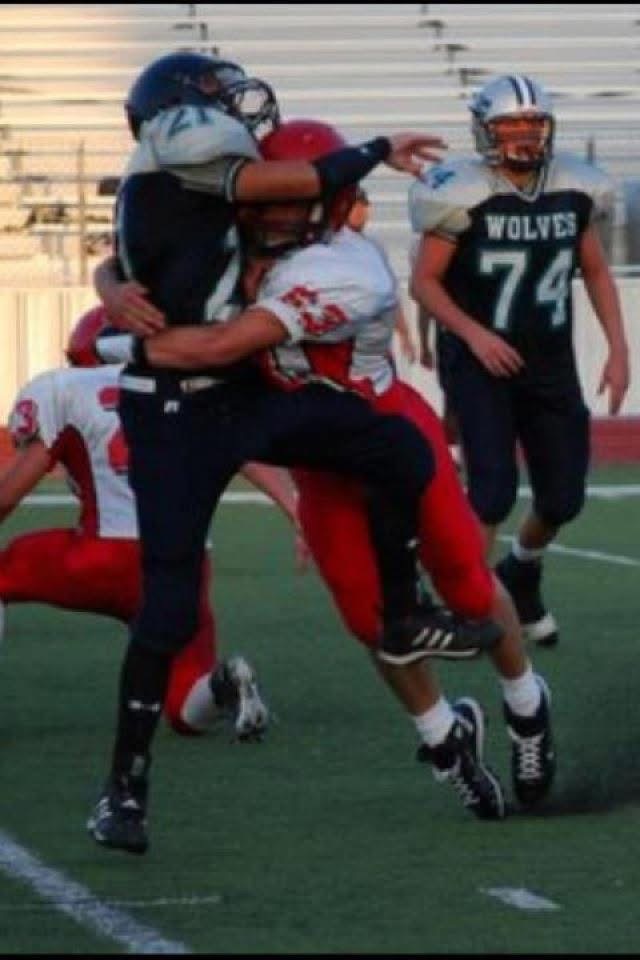 Ryan competing on the football field